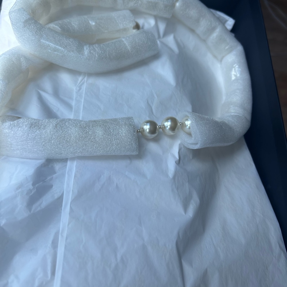 CHANEL Black Leather Wallet with Gold Accents